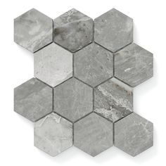 hexagonal marble tile with grey and white colors on the top, in an angled pattern