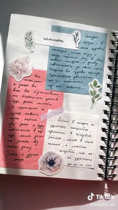 an open notebook with some writing on it