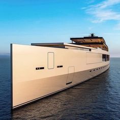 a large white boat floating on top of the ocean