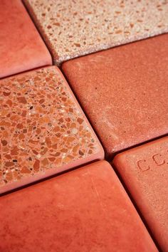 red and white tiles with the word love written on them