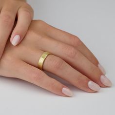 This lovely 4mm hammered band is a special yet classic choice as a wedding or commitment band. The hammered texture is both organic and refined. It stands alone, or stacks wonderfully with other rings in our collection. Matte finish. Shown in 18k yellow gold, this ring is available in white gold or platinum upon request. Elegant Hammered Stackable Rings, Hammered Stackable Rings For Wedding, Gold Hammered Stackable Rings For Promise, Elegant Hammered Thick Band Rings, Classic Hammered Yellow Gold Stackable Rings, Classic Yellow Gold Stackable Rings With Hammered Detail, Classic Yellow Gold Hammered Stackable Rings, Classic Hammered Yellow Gold Ring, Gold Hammered Stackable Rings For Anniversary