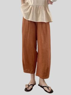 Brown Ankle Pants For Summer, Baggy Brown Ankle Pants, Brown Straight Harem Pants For Spring, Brown Tapered Leg Pants For Spring, Spring Brown Tapered Leg Pants, Brown Relaxed Fit Harem Pants For Spring, Brown Straight Pants For Summer, Summer Brown Straight Pants, Brown Straight Pants With Relaxed Fit