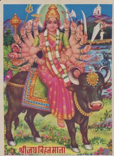 the hindu god sitting on top of a cow