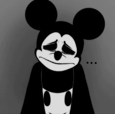 a black and white mickey mouse with eyes closed