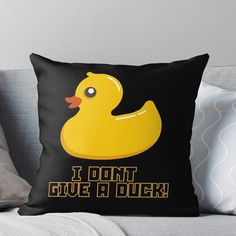 a yellow rubber duck with the words i don't give a duck on it