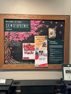 a bulletin board with pink flowers on it and information about the centerpointe program