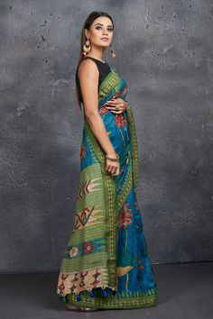 Look elegant at parties in this beautiful blue pen Kalamkari sari! The saree is enhanced with green border and pallu. It comes with a matching blouse piece. Shop Kalamkari sarees in USA from Pure Elegance. Disclaimer: The shown stitched blouse on the model is for display purpose only. The saree comes with a matching blouse piece and finished with fall and piko. Latest Designer Sarees, Kalamkari Saree, Fashion Journals, Tussar Silk Saree, Traditional Fabric, Pure Silk Sarees, Indian Sarees, Sarees Online, Blouse Piece