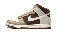 The Nike Dunk High ‘Light Chocolate” is an appealing earth-toned colorway of the vintage basketball shoe that was released in August 2021.  Versatile in “Light Chocolate,” this high-top Dunk features Sail-colored leather on the perforated toe that’s contrasted by Khaki leather overlays on the toe cap, forefoot, and eyelets.  The mid-panel, collar, and heel appear in Light Chocolate suede.  A Sail leather Swoosh logo appears on the sides and a light grey suede overlay is found on the heel.  Contr Chocolate Shoes, Yeezy Boots, Jordan 9 Retro, Nike Models, Jordan 13 Retro, Dunks Nike, Air Jordan 3 Retro, Jordan 12 Retro, Nike Dunk High