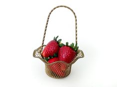 strawberries in a basket on a white background