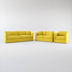 three yellow couches and one chair are in the same color as they appear to be made out of fabric