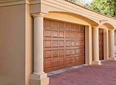 a house with two garage doors on each side