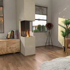 a living room filled with furniture and a fire place next to a wall mounted tv