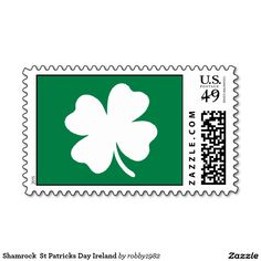 a postage stamp with a four leaf clover on it's front and bottom corner