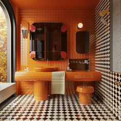 an orange bathroom with black and white checkered flooring on the walls, two sinks, toilet and mirror