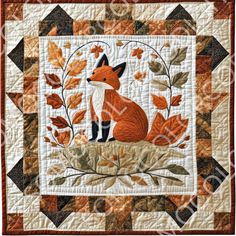 a quilted wall hanging with an image of a fox and autumn leaves on it