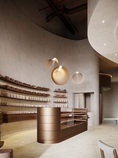 the inside of a store with shelves and lights hanging from it's ceilings