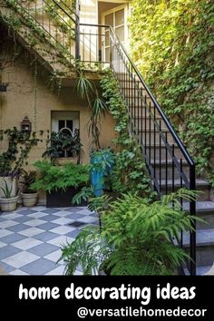 an outdoor courtyard with potted plants and stairs