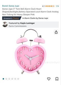 the pink alarm clock is on sale for $ 1, 99 and has two hands