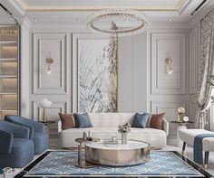 an elegant living room with blue and white furniture