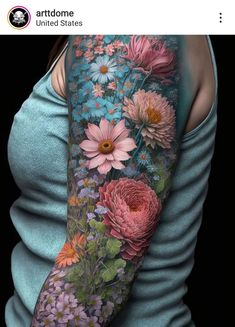 a woman's arm with flowers on it