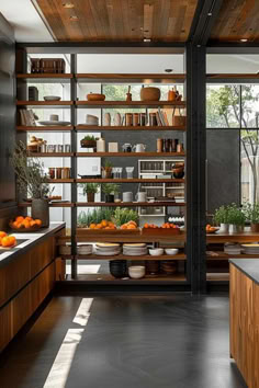 32 Open Shelving Kitchen Ideas That Are Practical and Stylish Mcm Open Shelving Kitchen, Open Shelving Between Rooms, Large Open Shelving Kitchen, Floor To Ceiling Open Shelving, Open Shelf Pantry, Studio Solutions, Modern Kitchen Stoves, Kitchen With Shelves, Shelving Kitchen Ideas