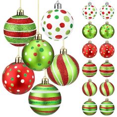 a bunch of christmas ornaments hanging from strings