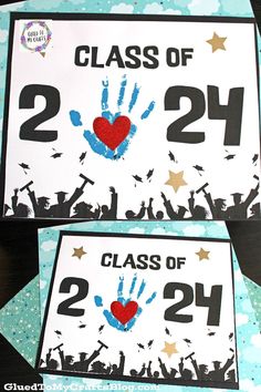 two handprinted cards that say class of 24 and the number twenty is on them