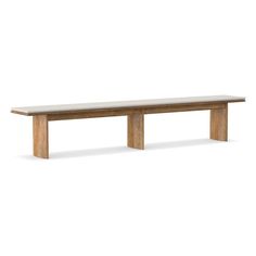 a wooden bench sitting on top of a white floor