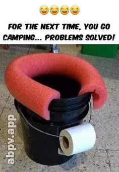 a black bucket with a roll of toilet paper in it that says, for the next time you go camping problems solve