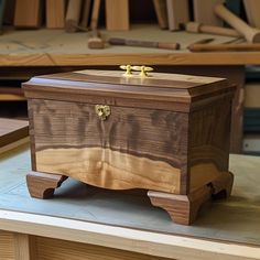 a wooden box sitting on top of a table