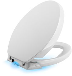 an image of a white toilet seat with blue light coming out of it's side