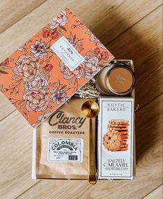 an assortment of food items sitting on top of a wooden table next to each other