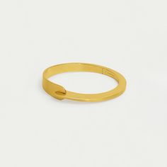 Inspired by New York City, this sleek brushed-finish bangle features an interlocking closure that's made for showing off.
Material: DD Signature brushed 18kt gold and high polish edges over high-quality brass.
Bracelet Diameter: 2.6"/ 60mm Brass Bracelet, Hinged Bangle, Cuff Bangles, Gold Bangles, Ring Necklace, Chain Bracelet, Chains Necklace, Statement Earrings, Clip On Earrings