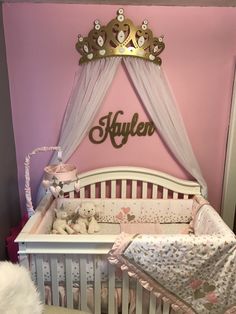 a baby crib with a teddy bear in it