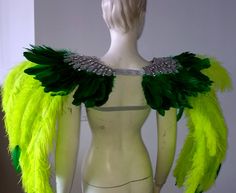 We make and ship our items really fast if you need it for a specific date please let us know. or call/text us at 954-3051817 to complete your order over the phone Ostrich Feather Fairy Wings Epaulet Shoulder Piece Angel Wings Feather Ostrich Fantasy Fest Carnival Showgirl samba Epaulette Shoulder pieces: All the round cut Stones are AB Crystal the Pear shape are Faux Crystal ( available in Silver or Gold) Feather are Ostrich Floss feathers and tips are duck feathers Secured with Glitter matching Feather Fairy, Shoulder Piece, Fantasy Fest, Samba Costume, Feather Angel Wings, Feather Headdress, Gold Feathers, Ostrich Feather, Colorful Feathers