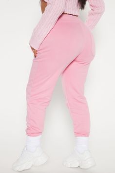 Everyone needs a pair of comfortable joggers in their wardrobe, and our pink Stole Your Boyfriend's Oversized Jogger is the perfect addition. Made with a soft cotton texture, these ankle length joggers feature cuffed hems, a high waisted rise, and straight leg shape. Complete with drawstrings for a customized fit, these joggers are perfect for a sporty look. Whether you're hitting the gym or running errands, these joggers will keep you comfortable and stylish all day. | Stole Your Boyfriend's Ov Fitted Joggers, Cotton Texture, Fashion Nova Models, Review Fashion, Loungewear Women, Fashion Nova Jeans, Loungewear Sets, Womens Loungewear, Sporty Look