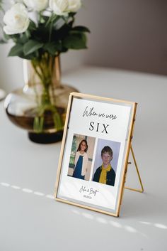 there is a sign that says welcome six with two pictures on it and flowers in the background