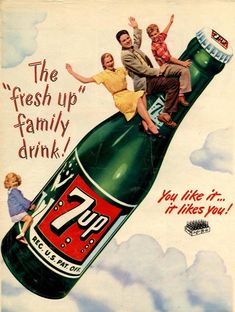 an advertisement for 7up with three people sitting on top of a large beer bottle