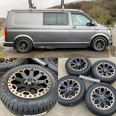 the van is parked next to several tires