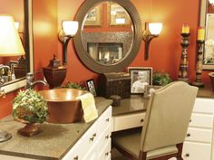 a bathroom with a vanity, sink and mirror in it's centerpieces