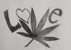 the word love written in black and white ink with a leaf on it's side