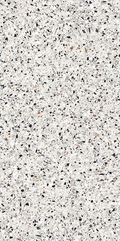 a white and black speckled surface is shown