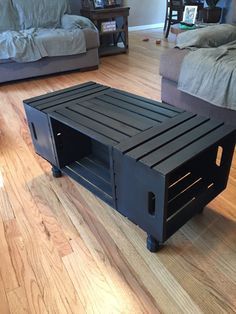 a coffee table made from an old crate