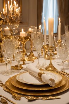 Elegant dining table set with gold-accented dinnerware, crystal glasses, and lit candles. Simple Dining Table Decor, Simple Dining Table