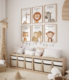 a nursery room with several pictures on the wall