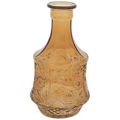 an old glass vase is shown against a white background