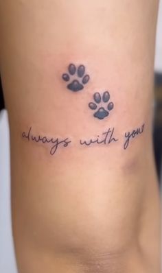 a woman with a tattoo on her stomach saying, always with you