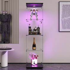 a purple light shines in the corner of a room next to a wine rack