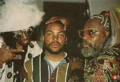 three men are dressed up and posing for the camera