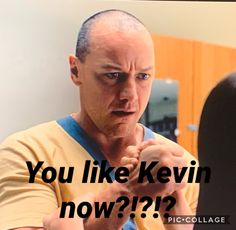 a man is looking at his reflection in the mirror with words on it that read, you like kevin now????